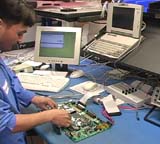 Technician testing board.